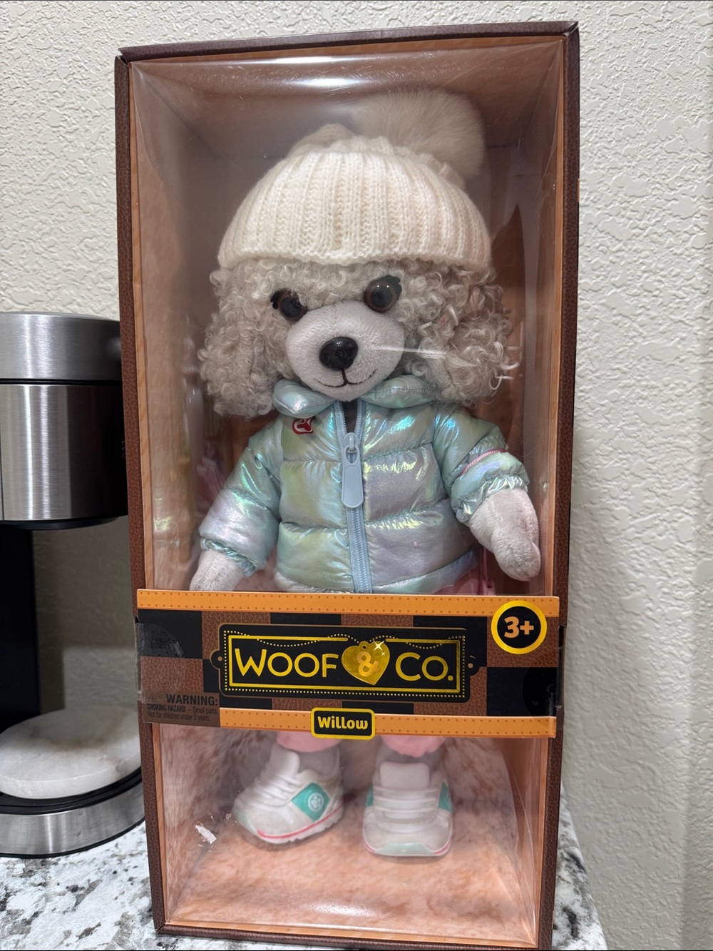 Willow Plush Dog in Iridescent Light Blue Jacket and Cream Knit Hat